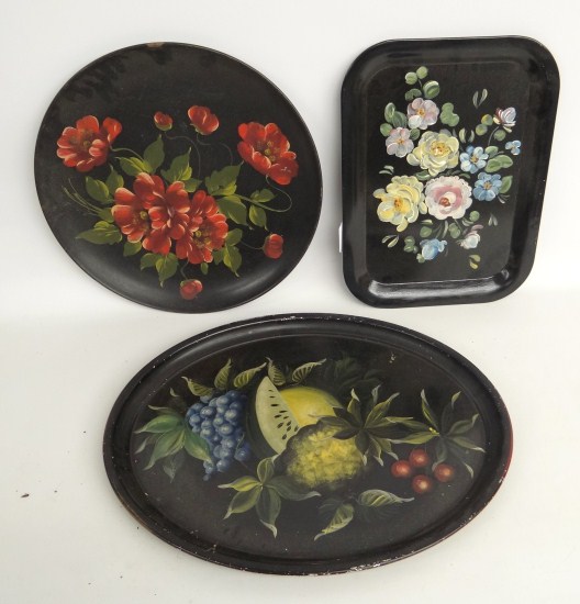 Lot three painted tole trays.