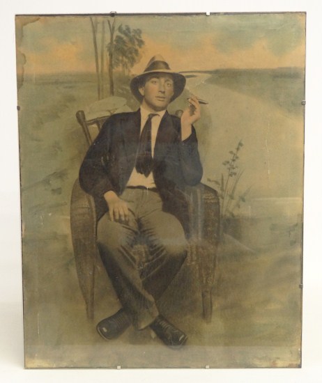 C. 1900s hand colored photo man with