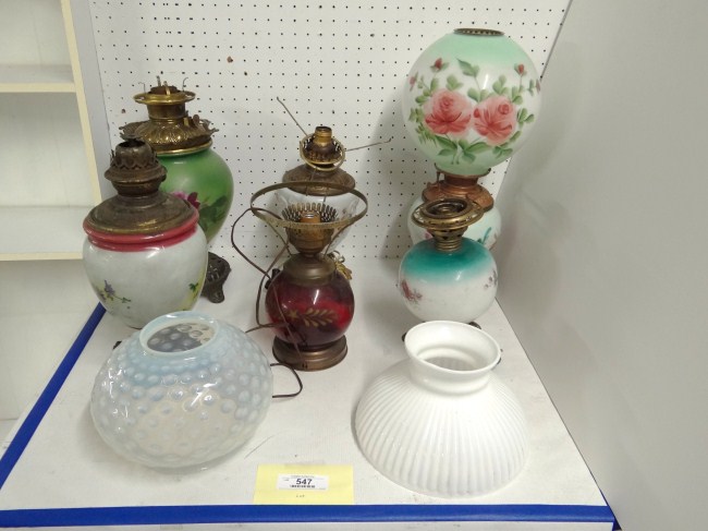 Lot misc. oil lamps and shades. One