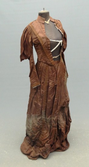 Early dress form with dress (as found).