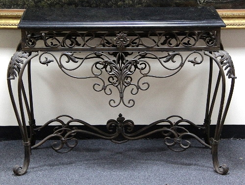 An iron pier table with black polished 168320