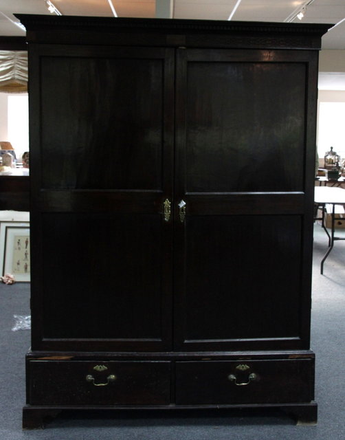 A George III mahogany wardrobe fitted