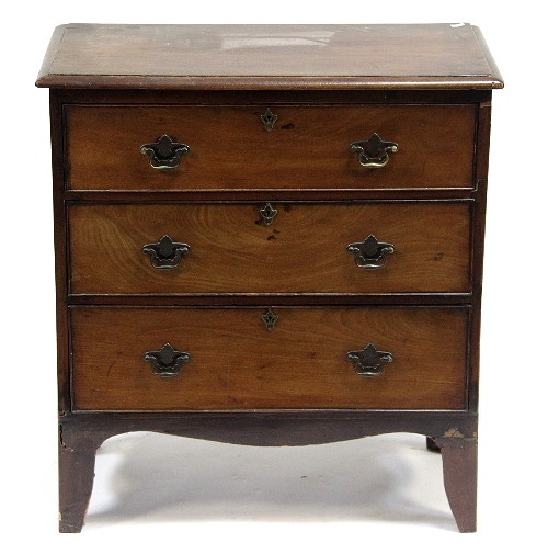 A mahogany chest fitted with three