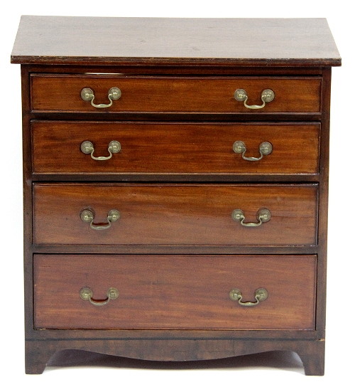 A mahogany chest of four graduated