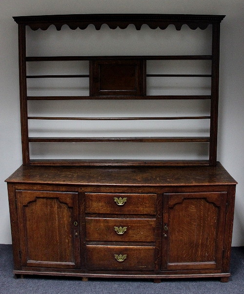 A 19th Century oak dresser the associated