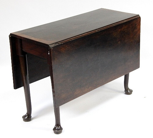 An 18th Century dropleaf table