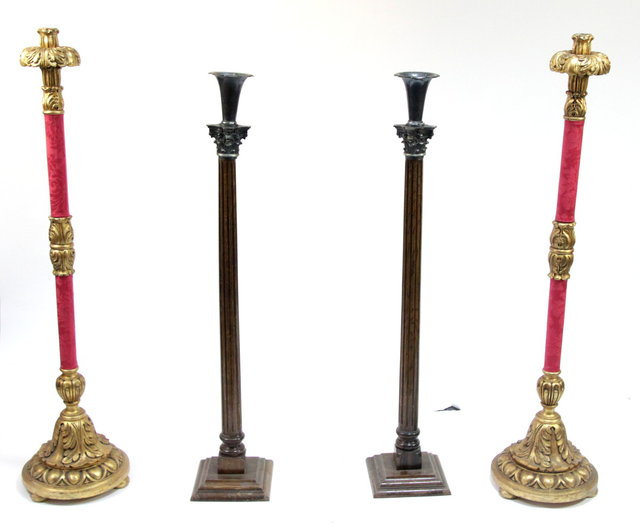 A pair of gilt wood candle lamps