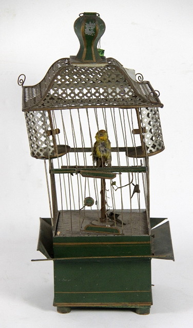 A singing bird automaton in a green
