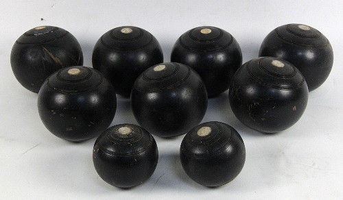 Seven turned wood bowls and two jacks