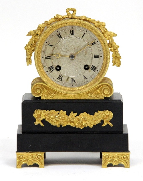 A Empire style ormolu mounted wall clock