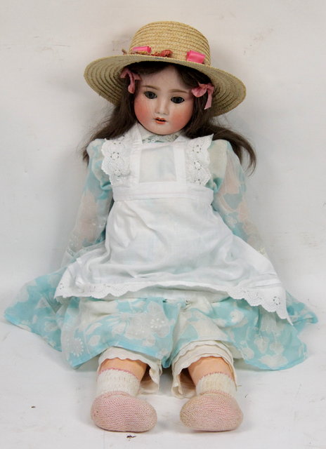 A Simon and Halbig bisque headed doll