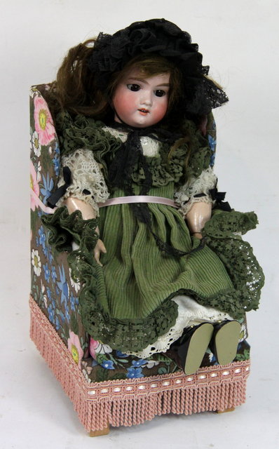 An Armand Marseille bisque headed doll