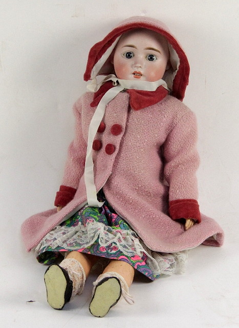 A Mignons German bisque headed doll