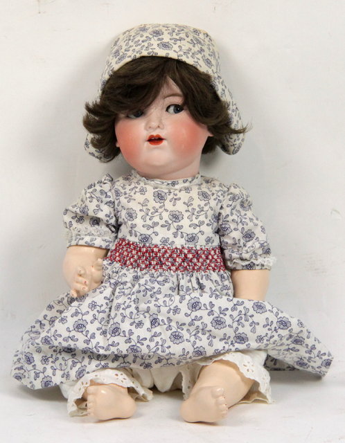 An Armand Marseille bisque headed doll