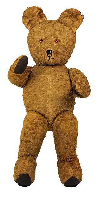 A teddy bear with floppy ears beaded