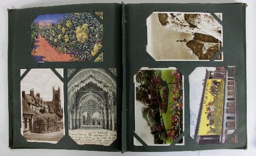 A postcard album of approximately