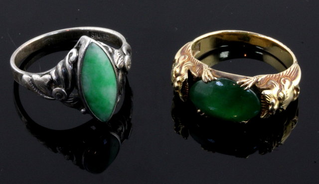 A Chinese ring set on oval jadiete 168458