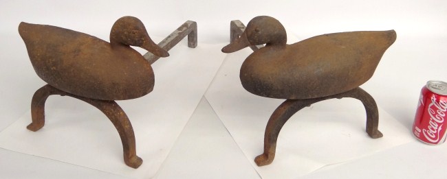 Pair cast iron duck andirons. Stamped