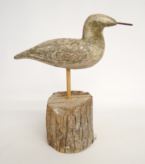 Painted wooden shorebird decoy.