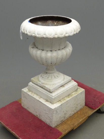 19th c. four part cast iron urn.