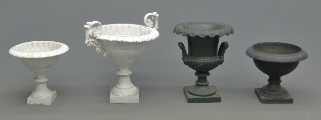 Lot four various cast iron urns  1687ff