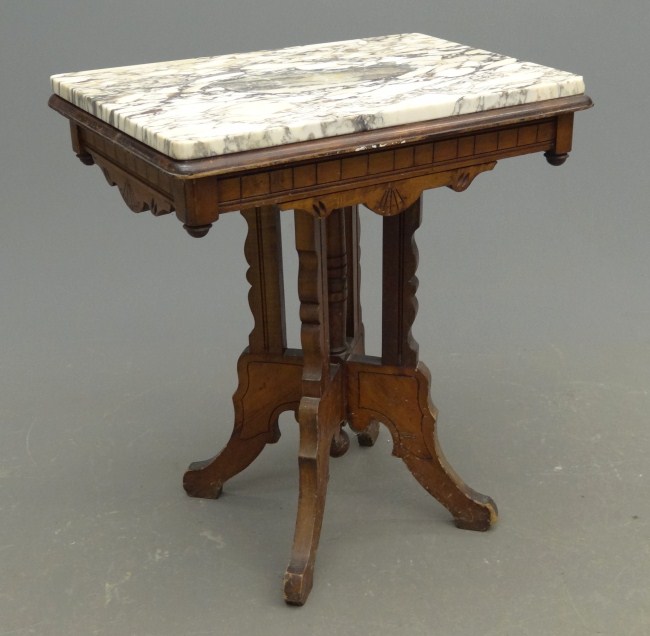 Victorian marble top Eastlake stand.