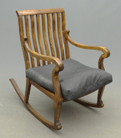 C. 1940's curved slat rocking chair.