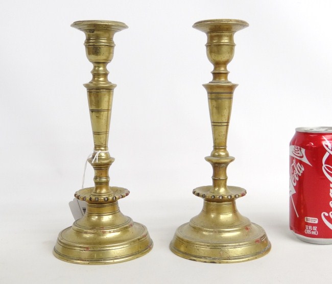 Near pair 17th c. brass brass candlesticks