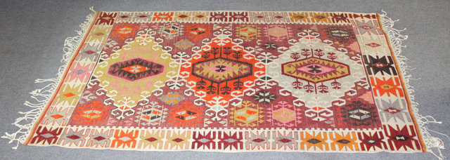 A Kilim rug with medallions on 16886f