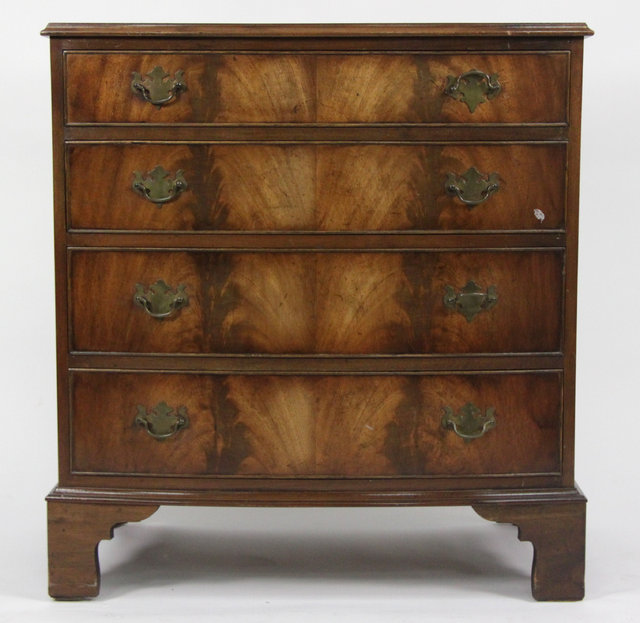 A mahogany bowfront chest of four