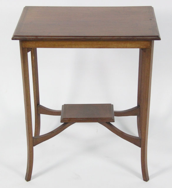 An Edwardian mahogany table with 168880