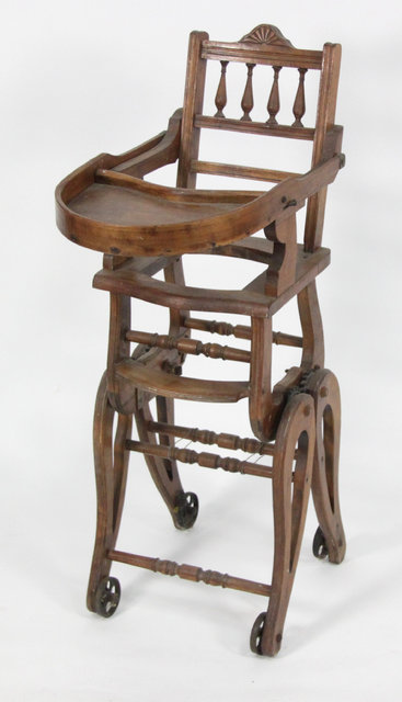 A childs metamorphic high chair in