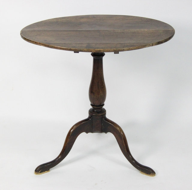 An elm table the oval top on a 168896