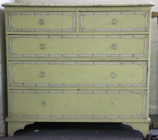 A white and yellow painted pine chest