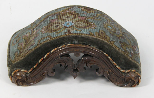A Victorian foot stool of arched