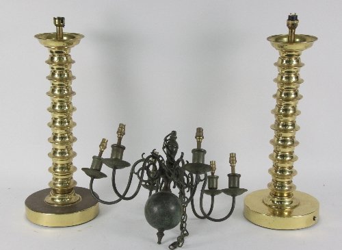 A pair of Sarach brass lamps the