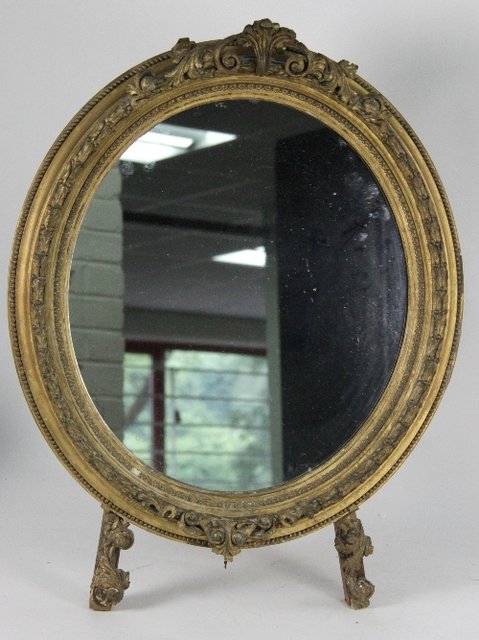 A gilt gesso framed easel type 1688b7