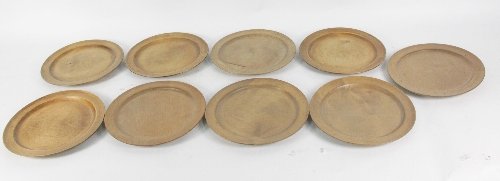 Nine turned beech platters 28cm