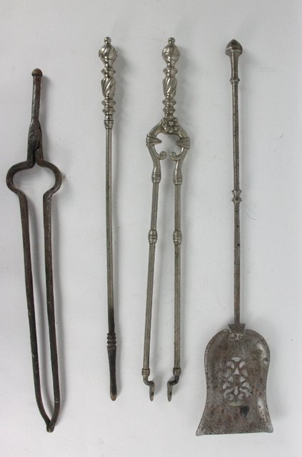 A set of four burnished steel fire irons