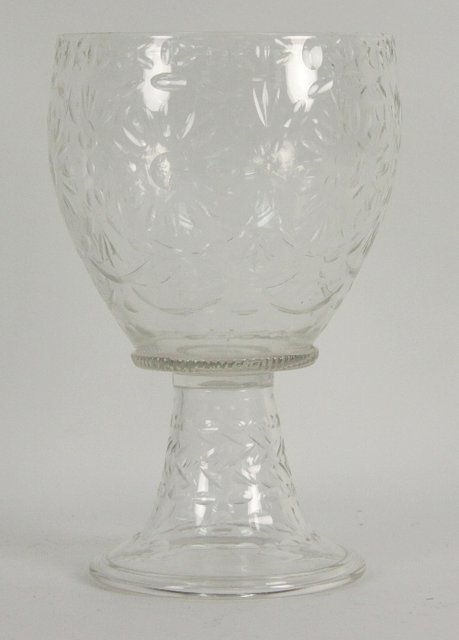 A large goblet cut flowerheads on a