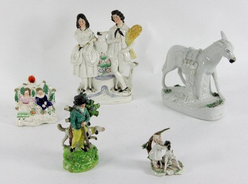 Four Staffordshire pottery figures and