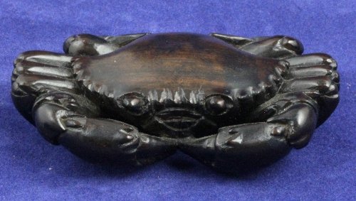 A wooden netsuke signed in red 168998
