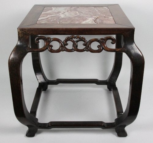 A Chinese square carved hardwood