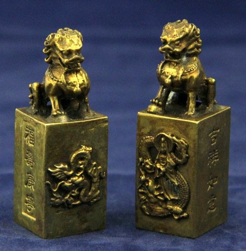 Two Chinese brass seals each with