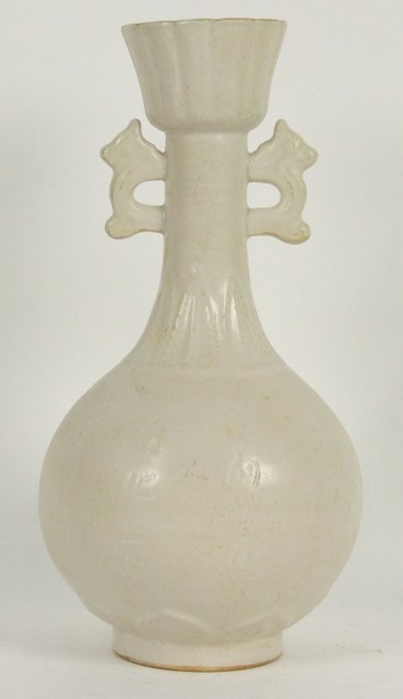 A Chinese white glazed bottle vase