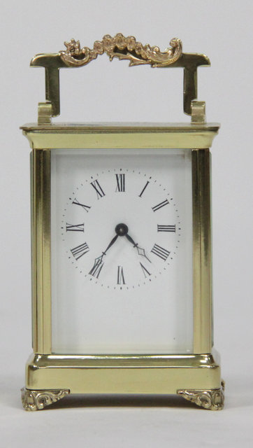 A gilt brass carriage time piece 1689cf