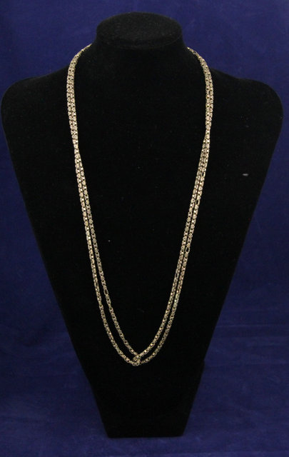 A 9ct gold guard chain of pierced