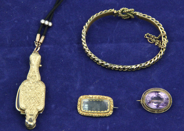 A gold cased French lorgnette with