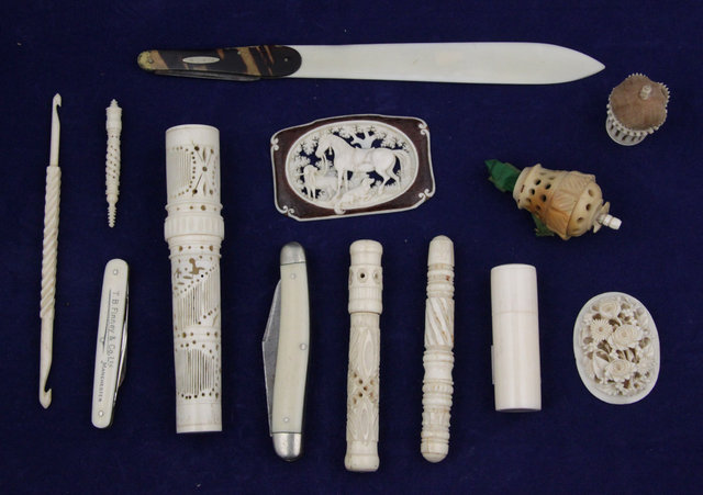 Five carved ivory bodkin cases