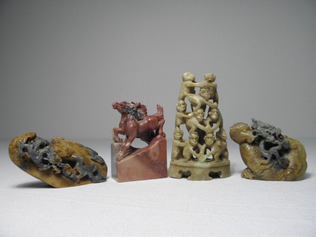 Lot of four Chinese stone carvings.